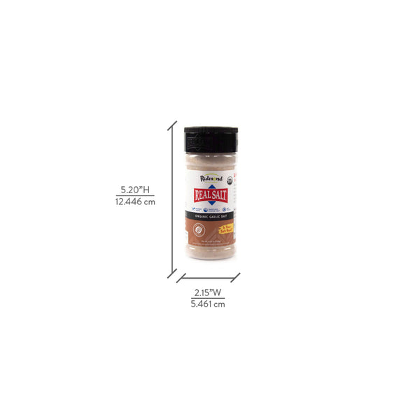 A shaker of Redmond Real Salt organic garlic salt stands against a white background, showcasing its label and size dimensions.