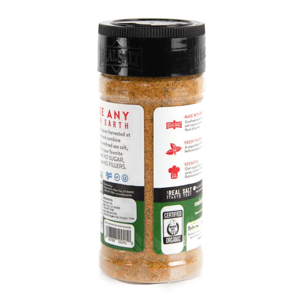 Clear shaker of Redmond Real Salt's organic seasoning blend, showcasing the nutritional information and ingredients label.