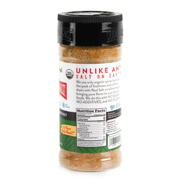 Clear shaker of Real Salt brand organic seasoning salt showcasing nutritional information and a green "USDA Organic" label.