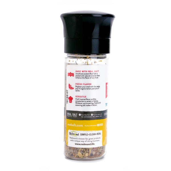 Redmond Real Salt Organic Seasoning Salt displays its unique blend of spices and minerals in a clear grinder bottle. 
