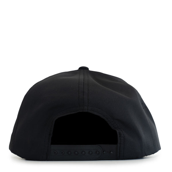 Black baseball cap displays adjustable black strap against white background.